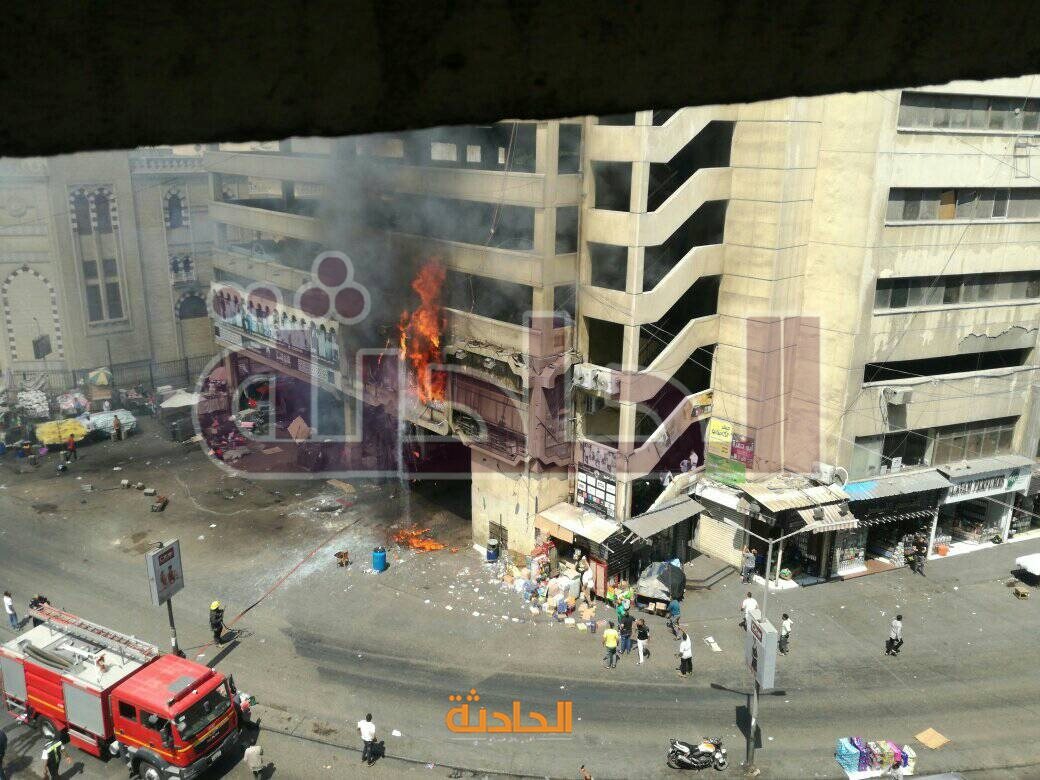 السيطرة علي حريق نشب بجراج العتبة