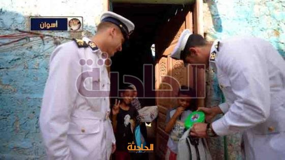 توزيع حقائب مدرسية بمشتملاتها ومواد غذائية على الأسر الأولى بالرعاية